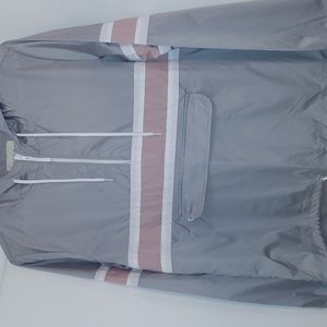 ZINE Women's lightweight pull-over windbreaker jacket. Size M